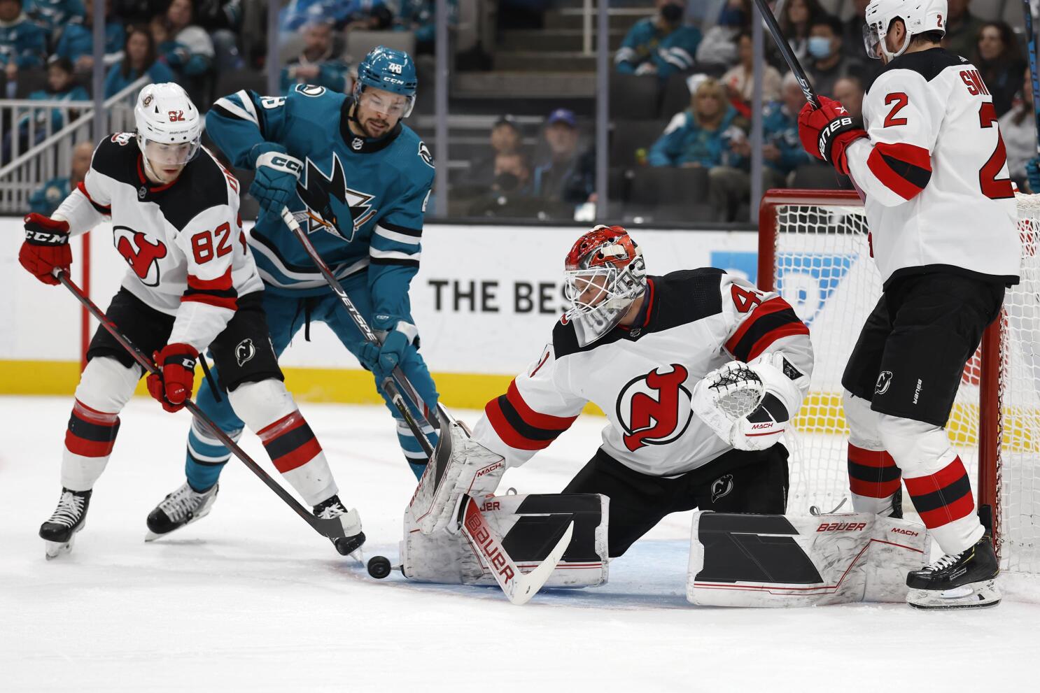 From left to right, San Jose Sharks center Tomas Hertl, left wing Alexander  Barabanov (94), right wing Timo Meier and center Logan Couture (39)  celebrate a goal by defenseman Erik Karlsson (obscured)