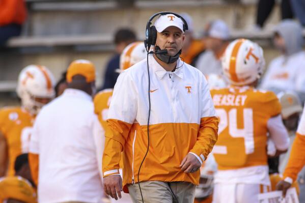 FILE - Tennessee coach Jeremy Pruitt watches during the first half of the team's NCAA college football game against Florida in Knoxville, Tenn., in this Saturday, Dec. 5, 2020, file photo. Tennessee is defending itself the Level I charge of failing to monitor the football program, saying former coach Jeremy Pruitt and nine others fired “repeatedly deceived” administrators and compliance staff overseeing the football program.  (Randy Sartin/Knoxville News Sentinel via AP, File)