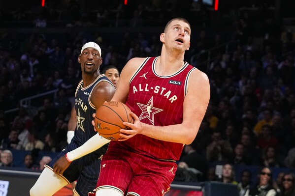 Denver Nuggets center Nikola Jokic (15) goes up for a shot during the first half of an NBA All-Star basketball game in Indianapolis, Sunday, Feb. 18, 2024. (APPhoto/Darron Cummings)
