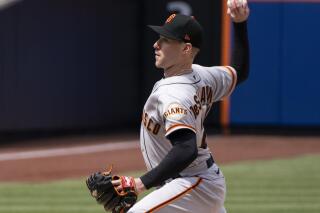 Anthony DeSclafani of the San Francisco Giants pitches in the first inning during a baseball game against the New York Mets on Thursday, April 21, 2022, in New York. (AP Photo/Craig Ruttle)
