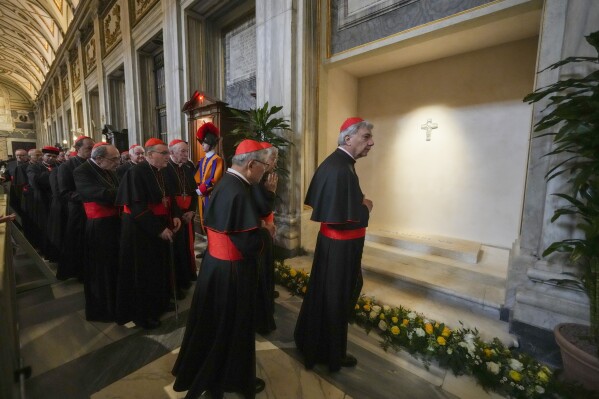 Cardinals visit the tomb of late Pope Francis inside St. Mary Major Basilica in Rome, Sunday, April 27, 2025. (AP Photo/Andrew Medichini)