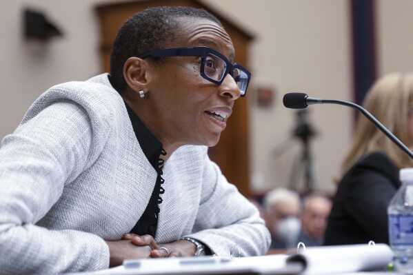 FILE - Harvard President Claudine Gay, left, speaks as University of Pennsylvania President Liz Magill listens during a hearing of the House Committee on Education on Capitol Hill, Tuesday, Dec. 5, 2023 in Washington. Gay will remain leader of the prestigious Ivy League school following her comments last week at a congressional hearing on antisemitism, the university's highest governing body announced Tuesday, Dec. 12. (AP Photo/Mark Schiefelbein, File)