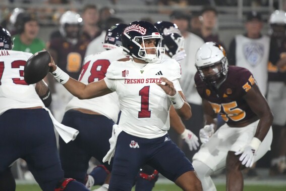 Fresno State quarterback Mikey Keene (1) passes the ball against Arizona State during the first half of an NCAA college football game Saturday, Sept. 16, 2023, in Tempe, Ariz. (AP Photo/Rick Scuteri)