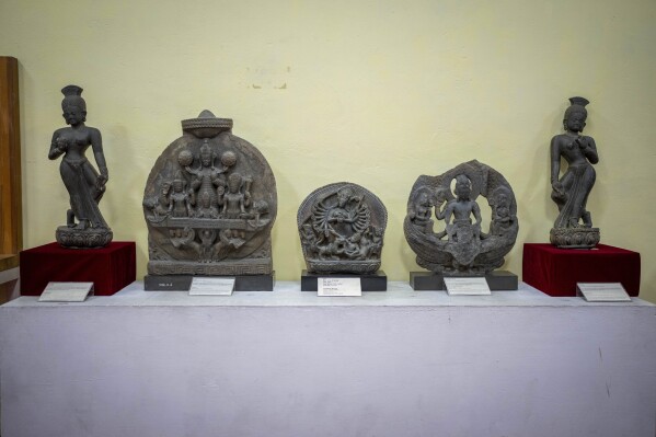 Stolen artifact brought back from various part of the world are seen displayed at the National Museum in Kathmandu, Nepal, Jan. 3, 2024. An unknown number of sacred statues of Hindu deities were stolen and smuggled abroad in the past. Now dozens are being repatriated to the Himalayan nation, part of a growing global effort to return such items to countries in Asia, Africa and elsewhere. (AP Photo/Niranjan Shrestha)