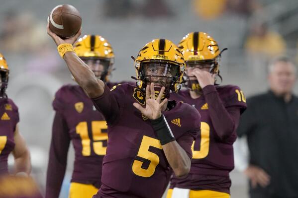 Arizona State quarterback Jayden Daniels (5) warms up prior to an NCAA college football game against Southern Utah, Thursday, Sept. 2, 2021, in Tempe, Ariz. (AP Photo/Matt York)