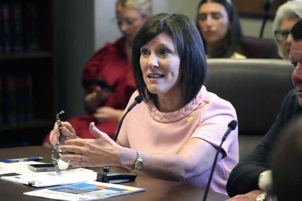 Mississippi House Medicaid Committee Chairman Rep. Missy McGee, R-Hattiesburg, discusses the cost of Medicaid expansion at a public legislative conference committee meeting held at the State Capitol, Tuesday, April 23, 2024, in Jackson, Miss. (AP Photo/Rogelio V. Solis)