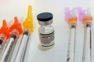 FILE - Booster shots of the Pfizer COVID-19 vaccine are displayed during a vaccine clinic in Townshend, Vt., on Tuesday, Sept. 20, 2022. U.S. health officials say 4.4 million Americans have rolled up their sleeves for the updated COVID-19 booster shot. The Centers for Disease Control and Prevention posted the count Thursday as public health experts bemoaned President Joe Biden’s recent remark that “the pandemic is over.” (Kristopher Radder/The Brattleboro Reformer via AP)