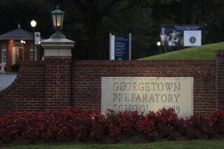 
              The entrance to the Georgetown Preparatory School Bethesda, Md., is shown, Wednesday, Sept. 19, 2018. Supreme Court nominee Brett Kavanaugh spent most of his teen years at the preparatory school in the 1980’s.  And exactly what happened one summer night during that time has become a question that threatens to unravel his chances of joining the nation's highest court. (AP Photo/Manuel Balce Ceneta)
            
