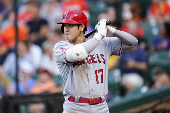 Los Angeles Angels designated hitter Shohei Ohtani stands at the on deck circle during the third inning of a baseball game against the Baltimore Orioles, Thursday, July 7, 2022, in Baltimore. (AP Photo/Julio Cortez)