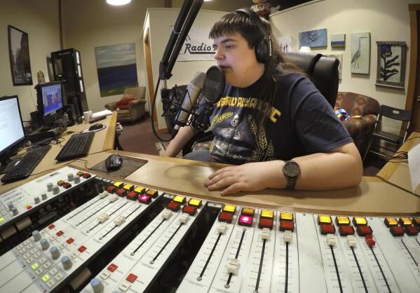In this March 18, 2017 photo, Chaz Wing records the weather forecast at a radio station in Brunswick, Maine. Wing has testified that he was raped by other kids three times in junior high, even after repeatedly complaining of harassment to teachers and administrators. Chaz’s saga is more than a tale of escalating bullying. Across the U.S., thousands of students have been sexually assaulted, by other students, in high schools, junior highs and even elementary schools _ a hidden horror educators have long been warned not to ignore. (AP Photo/Robert F. Bukaty)