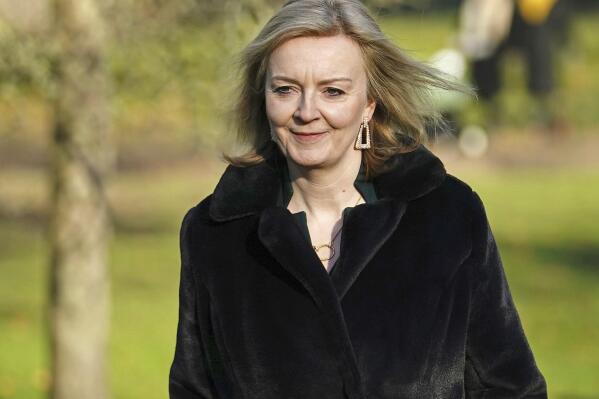 British Foreign Secretary Liz Truss walks through St. James's Park, central London, Friday, Jan. 14, 2022 after her comments that there is a "deal to be done" with the European Union over the Northern Ireland Protocol. U.K. Foreign Secretary Liz Truss called for Britain and the European Union to rebuild their relationship, as she and bloc’s top Brexit official met Thursday for talks on a thorny dispute over Northern Ireland trade. (Aaron Chown/PA via AP)