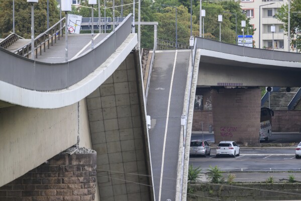 Parts of the Carola Bridge over the Elbe is seen collapsed in Dresden, eastern Germany, Wednesday, Sept. 11, 2024. (Robert Michael/dpa via AP, File)