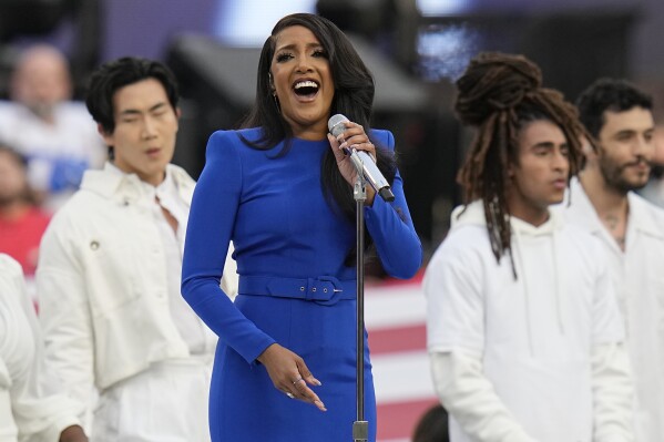 Country music artist Mickey Guyton performs the national anthem before the NFL Super Bowl 56 football game between the Los Angeles Rams and the Cincinnati Bengals in Inglewood, Calif., on Feb. 13, 2022. (AP Photo/Chris O'Meara, File)