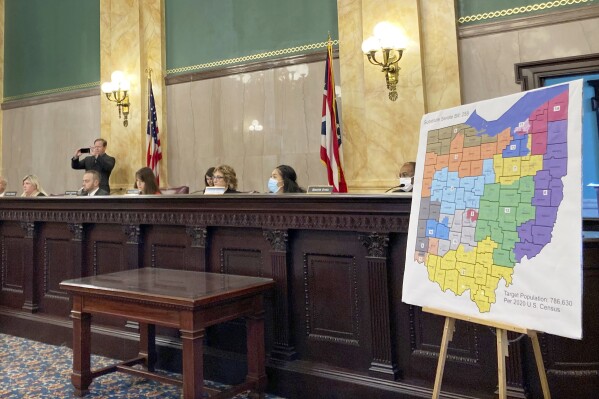 FILE - Members of the Ohio Senate Government Oversight Committee hear testimony on a new map of state congressional districts, Nov. 16, 2021, at the Ohio Statehouse in Columbus, Ohio. Ohio voting-rights groups moved to dismiss their lawsuit against Ohio's unconstitutional congressional map on Tuesday, Sept. 5, 2023, arguing that prolonging the legal wrangling over where to draw district boundaries isn't in the best interests of Ohio voters. (AP Photo/Julie Carr Smyth, File)