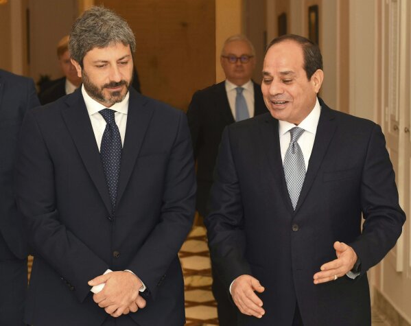 
              FILE - In this Sept. 17, 2018 file photo, released by the Egyptian Presidency, Egyptian President Abdel-Fattah el-Sissi, right, walks with Roberto Fico, president of Italy's Chamber of Deputies, in Cairo, Egypt. Fico complained that Cairo has not made much progress on the unresolved case of an Italian student gruesomely killed in Cairo in 2016. Suspicion in Italy fell on Egypt’s security forces, notorious for their abuses. The disappearance of Saudi Journalist Jamal Khashoggi, during a visit to his country’s consulate in Istanbul on Oct. 2, 2018, raises a dark question for anyone who dares criticize governments or speak out against those in power: Will the world have their back? (Egyptian Presidency via AP, File)
            