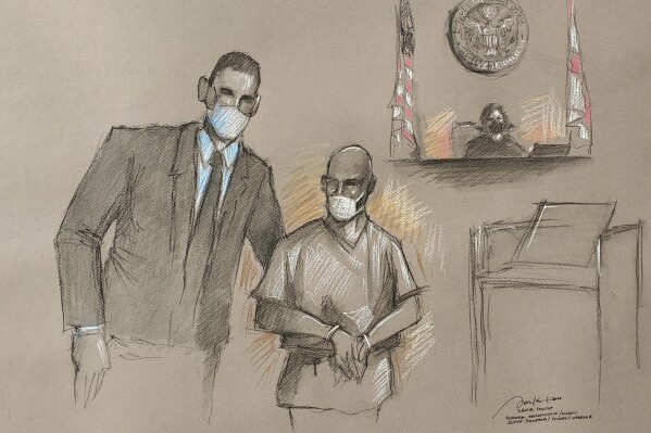 FILE - This photo of an artist rendering shows Mario Antonio Palacios Palacios with his attorney Alfredo Izaguirre before U.S. Magistrate Judge Jacqueline Becerra in federal court, Feb. 4, 2022, in Miami. The former Colombian soldier pleaded guilty on Dec. 22, 2023 to conspiring in the 2021 assassination of Haitian President Jovenel Moïse, which plunged the Caribbean nation into violence and political turmoil. (Daniel Pontet via AP, File)