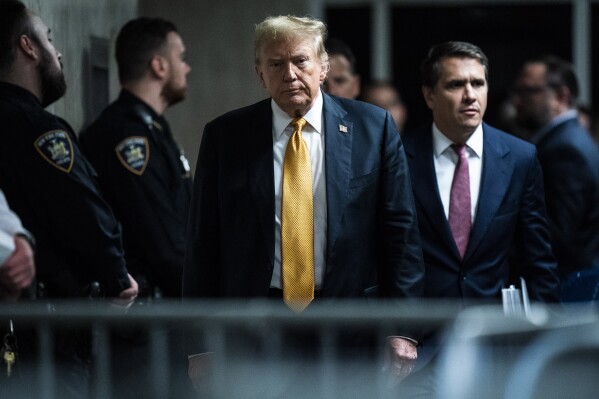 Former President Donald Trump walks out to speak to reporters as jurors begin deliberations for his trial at the Manhattan criminal court, Wednesday, May 29, 2024, in New York. (Jabin Botsford/The Washington Post via AP, Pool)