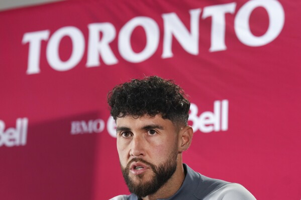 Jonathan Osorio, midfielder and captain of Toronto FC, speaks to the media during an MLS soccer news conference in Toronto, Oct. 17, 2024. (Nathan Denette/The Canadian Press via AP, File)