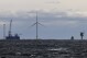FILE - The first operating South Fork Wind farm turbine, Thursday, Dec. 7, 2023, 35 miles east of Montauk Point, N.Y. The federal government said Friday, March 15, 2024, it’s moving forward with developing a large area of ocean off New England for offshore wind.(AP Photo/Julia Nikhinson, File)