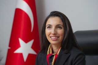 FILE - Governor of the Central Bank of Turkey Hafize Gaye Erkan poses for a photograph at her office in Ankara, Thursday, July 6, 2023. The governor of Turkey’s central bank has resigned only months after taking office amid allegations of improper use of power and family interference in the workings of the financial institutions. Erkan was the bank's first female chief. She announced her resignation on social media late Friday, Feb. 2, 2024 saying she was a victim of a “character assassination campaign” and would resign to spare her family further anguish. (Riza Ozel/Dia Images via AP, File)