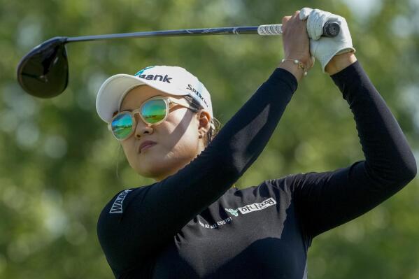 Minjee Lee, of Australia, hits off the 18th tee during the first round of the Mizuho Americas Open golf tournament, Thursday, June 1, 2023, at Liberty National Golf Course in Jersey City, N.J. (AP Photo/John Minchillo)