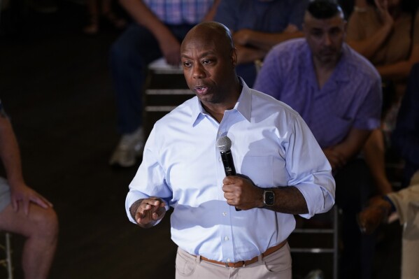 Republican presidential candidate Sen. Tim Scott, R-S.C., speaks during a town hall meeting, Thursday, July 27, 2023, in Ankeny, Iowa. (AP Photo/Charlie Neibergall)