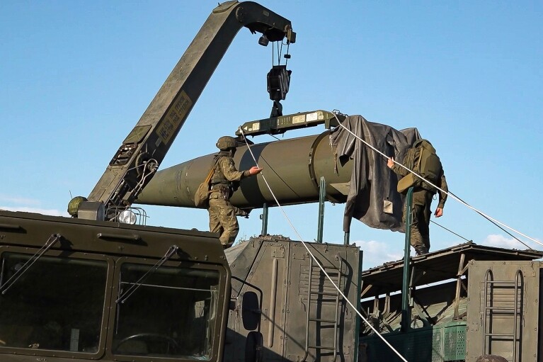 FILE - In this photo released by Russian Defense Ministry Press Service on May 21, 2024, Russian troops load an Iskander missile as part of drills to train the military for using tactical nuclear weapons at an undisclosed location in Russia. (Russian Defense Ministry Press Service via AP, File)