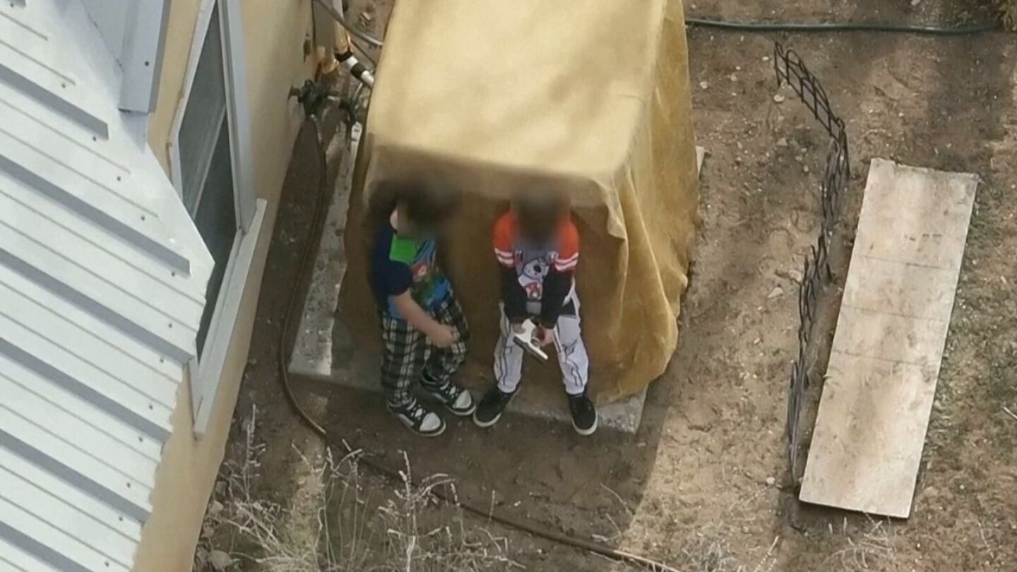 Drone footage shows New Mexico deputies disarm children handling a loaded gun