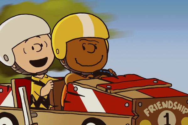 This image released by Apple TV+ shows Peanuts characters Charlie Brown, left, and Franklin in a scene from the animated special “Snoopy Presents: Welcome Home, Franklin," premiering Friday. (Apple TV+ via AP)