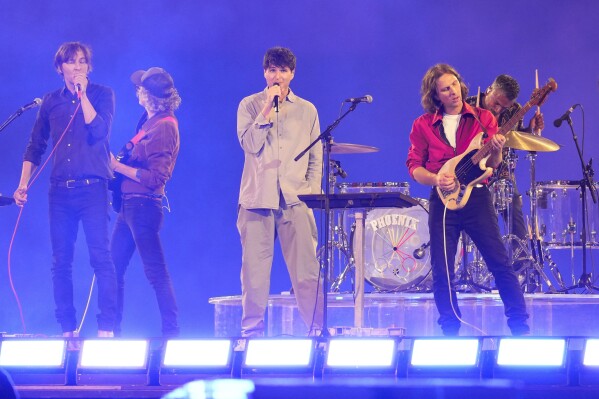 Phoenix performs during the 2024 Summer Olympics closing ceremony at the Stade de France, Sunday, Aug. 11, 2024, in Saint-Denis, France. (AP Photo/Ashley Landis)