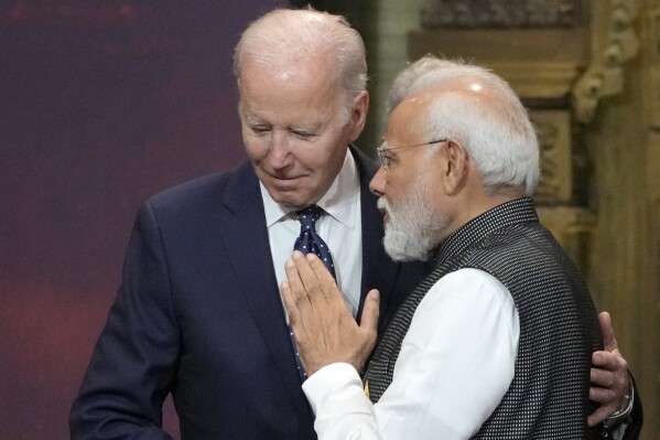 FILE - U.S. President Joe Biden, left, and India Prime Minister Narendra Modi talk during the G20 leaders summit in Nusa Dua, Bali, Indonesia, Nov. 15, 2022. The warm ties India and the United States have built are being tested after US prosecutors on Wednesday, Nov. 29, 2023, accused an Indian official of orchestrating an alleged assassination plot in New York City. (AP Photo/Dita Alangkara, Pool, File)