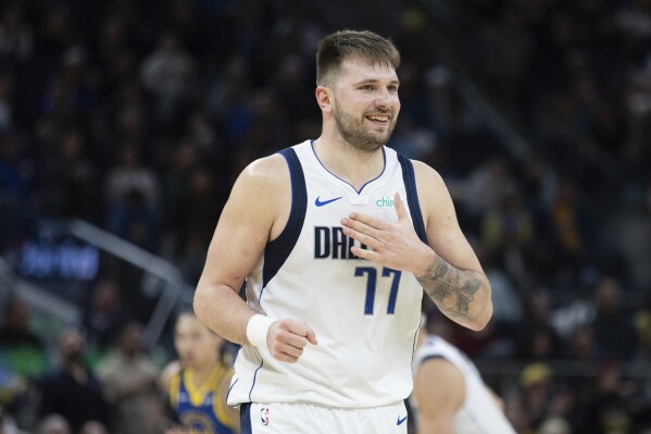 Luka Doncic, Kyrie Irving ruled out of Mavericks game against Clippers | AP  News
