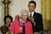 
              FILE - In this Aug. 12, 2009 file photo, President Barack Obama presents the 2009 Presidential Medal of Freedom to Sandra Day O'Connor.  O'Connor, the first woman on the Supreme Court, announced Tuesday that she has the beginning stages of dementia, “probably Alzheimer’s disease.”   (AP Photo/J. Scott Applewhite)
            