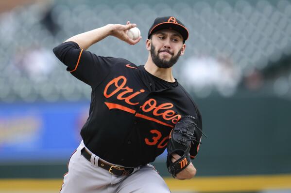 Rodriguez gets 1st MLB win, Orioles split DH with Tigers