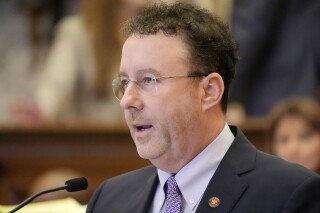 Sen. David Parker, R-Olive Branch, chair of the Mississippi Senate Accountability, Efficiency, Transparency Committee, presents ballot initiative legislation for the chamber to consider, Thursday, March 14, 2024, at the Mississippi Capitol in Jackson, Miss. (AP Photo/Rogelio V. Solis)