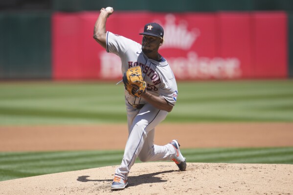 Houston Astros pitcher Ronel Blanco works against the Oakland Athletics during the first inning of a baseball game in Oakland, Calif., Sunday, May 26, 2024. (AP Photo/Jeff Chiu)