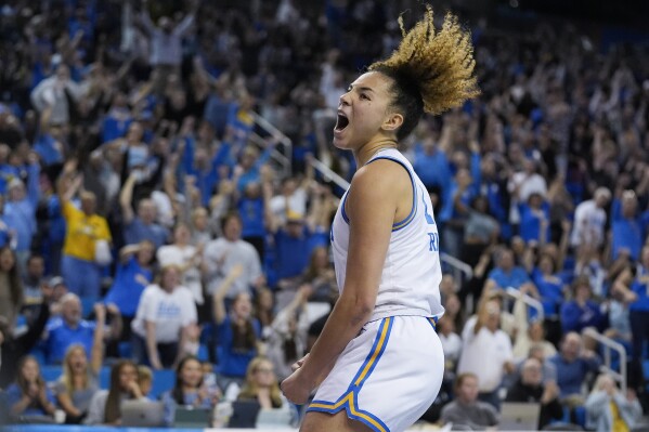 UCLA guard Kiki Rice celebrates after scoring during the second half of a second-round college basketball game against Creighton in the women's NCAA Tournament Monday, March 25, 2024, in Los Angeles. (AP Photo/Marcio Jose Sanchez)