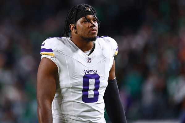 FILE - Minnesota Vikings linebacker Marcus Davenport walks off the field after an NFL football game, Sep. 14, 2023, in Philadelphia. The Detroit Lions agreed to a $10.5 million, one-year contract with edge rusher Davenport, according to a person familiar with the deal who spoke Monday, March 11, 2024, on condition of anonymity because it had not been finalized. (AP Photo/Rich Schultz, File)