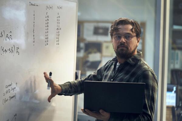 This image released by Netflix shows Leonardo DiCaprio in "Don't Look Up." (Niko Tavernise/Netflix via AP)