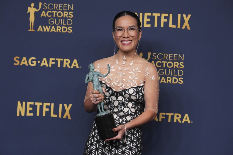 Ali Wong poses in the press room with the award for outstanding performance by a female actor in a television movie or limited series for "Beef" during the 30th annual Screen Actors Guild Awards on Saturday, Feb. 24, 2024, at the Shrine Auditorium in Los Angeles. (Photo by Jordan Strauss/Invision/AP)