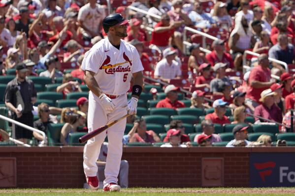 St. Louis Cardinals' Albert Pujols watches his solo home run during the sixth inning of a baseball game against the Philadelphia Phillies Sunday, July 10, 2022, in St. Louis. (AP Photo/Jeff Roberson)