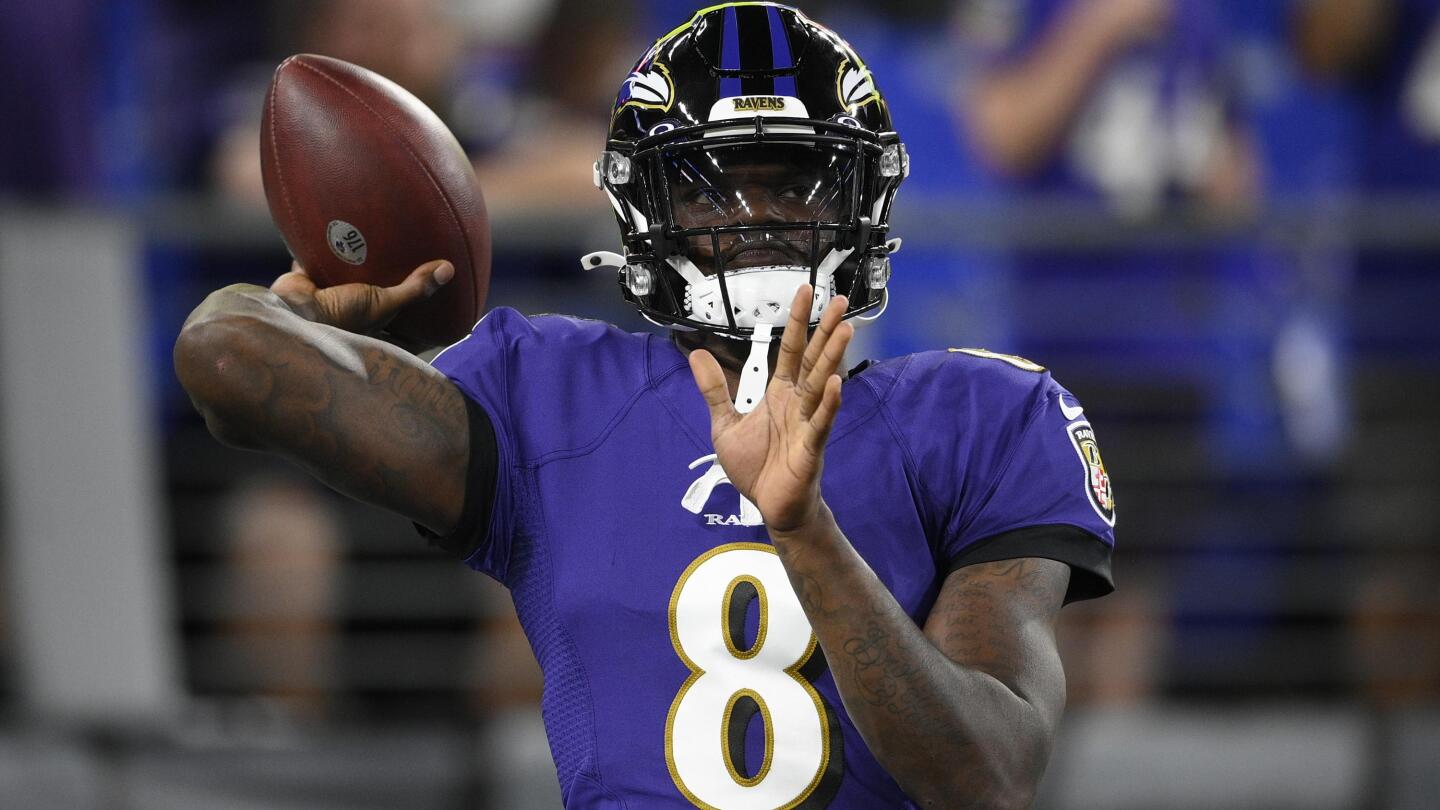 Lamar Jackson runs wild again, this time to top Seattle - The