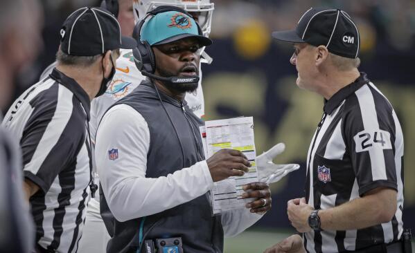 Former Miami Dolphins head coach Brian Flores claims he was offered money  to keep quiet after firing