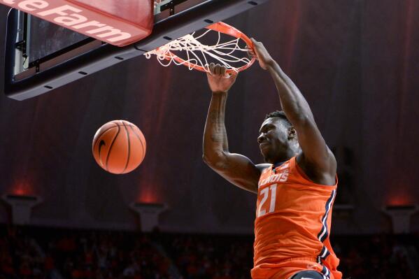 Illinois' Kofi Cockburn dunks during the first half of the team's NCAA exhibition college basketball game against Indiana of Pennsylvania on Friday, Oct. 29, 2021, in Champaign, Ill. (AP Photo/Michael Allio)