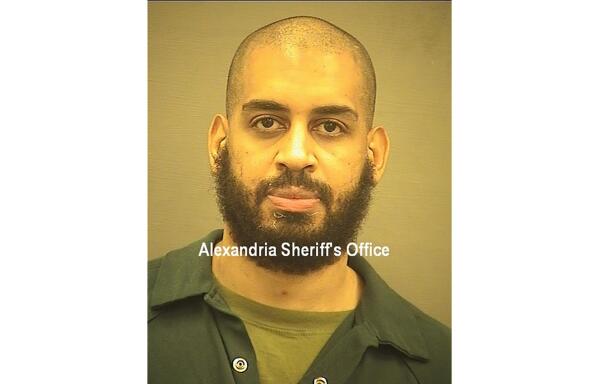 FILE - In this photo provided by the Alexandria Sheriff's Office is Alexanda Kotey who is in custody at the Alexandria Adult Detention Center, Wednesday, Oct. 7, 2020, in Alexandria, Va. The British national who played a key role in a scheme by the Islamic State to kidnap and kill Western hostages a decade ago has been sentenced to life in prison. Kotey was one of several British captors known as "the Beatles" by their captives because of their accents. The life sentence imposed Friday, April 29, 2022, was automatic under the plea deal he made last year. (Alexandria Sheriff's Office via AP, File)