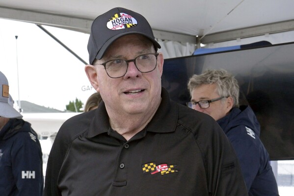 FILE - Former republican Maryland Gov. Larry Hogan visits the Bridge Boat Show in Stevensville, Md., April 12, 2024. Democrats voting in Maryland's contentious primary for Senate are divided about who is best positioned to beat Hogan. Congressman David Trone and Prince George's County Executive Angela Alsobrooks are the most prominent candidates in the Democratic primary. (AP Photo/Susan Walsh, File)