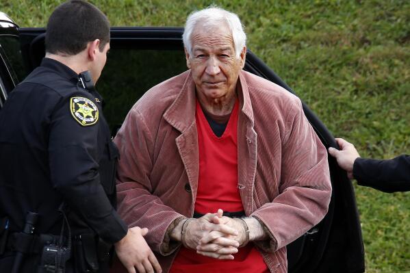 FILE – In this Oct. 29, 2015, file photo, former Penn State University assistant football coach Jerry Sandusky arrives for an appeal hearing at the Centre County Courthouse in Bellefonte, Pa. Penn State has paid out an additional $16 million to people with claims they were sexually abused by Sandusky, raising the total amount of payouts to $109 million, the school disclosed Friday, Nov. 10, 2017. The university also disclosed it spent at least $4.9 million during the 2016-17 school year on related internal investigations and costs. (AP Photo/Gene J. Puskar, File)