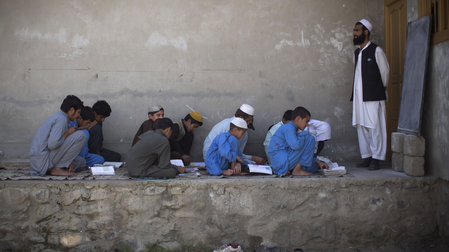 Taliban’s abusive education policies harm boys as well as girls in Afghanistan, rights group says