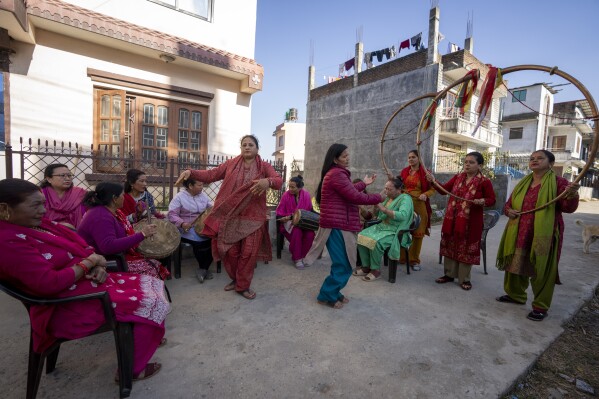The members of Shrijanshil Mahila Sanstha, or the Self-Reliant Women’s Group, dance during a rehearsal in Kathmandu, Nepal, Tuesday, March 5, 2024. (AP Photo/Niranjan Shrestha)