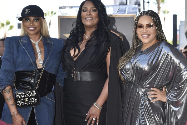 Sandra Denton (Pepa), from left, DJ Spinderella, and Cheryl James (Salt) attend a ceremony honoring Salt-N-Pepa with a star on the Hollywood Walk of Fame on Friday, Nov. 4, 2022, in Los Angeles. (Photo by Richard Shotwell/Invision/AP, file)